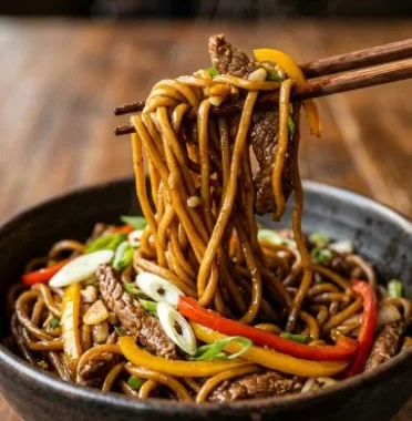 Beef Lo Mein Stir Fry 1 Delicious Beef Lo Mein Stir Fry with vegetables and noodles