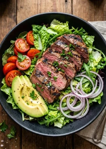 Delicious grilled steak avocado salad with fresh ingredients