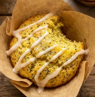 Healthy lemon poppy seed muffins baked with fresh lemon zest and poppy seeds