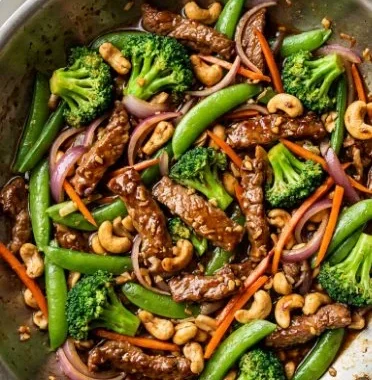 Delicious Turkey Stir Fry with colorful vegetables in a skillet
